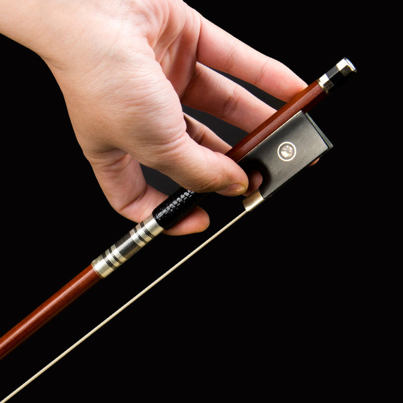 Close-up of Ebony Frog – detailed view of ebony frog with abalone inlay on Brazilwood violin bow